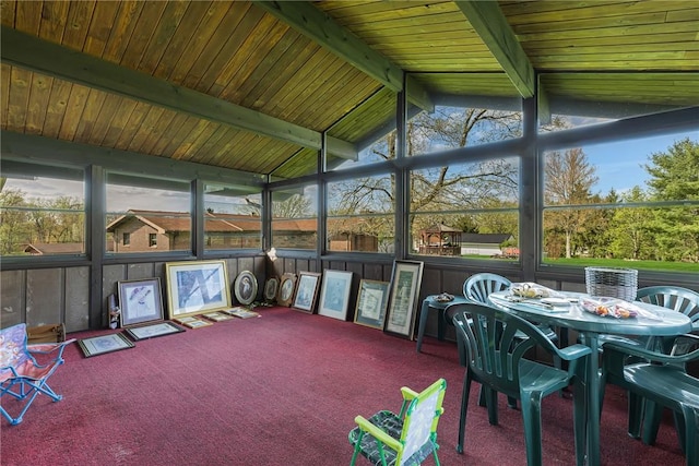 sunroom / solarium with carpet and wooden ceiling