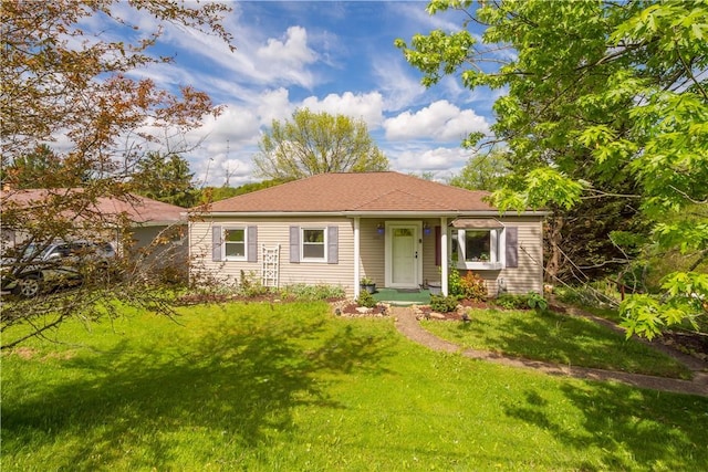 view of front of house with a front lawn