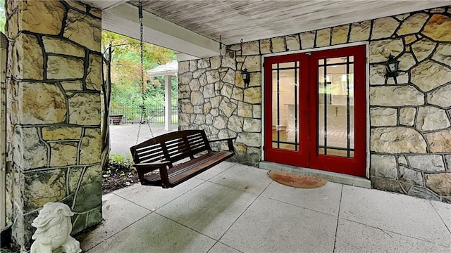 6927 Perrysville Ave, Ben Avon, PA 15202 - view of exterior entry with stone siding and french doors