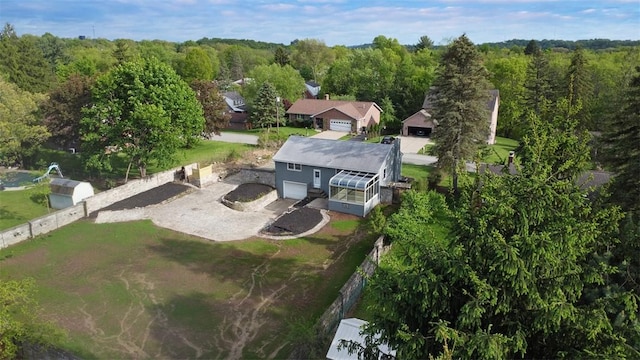view of subject property featuring a forest