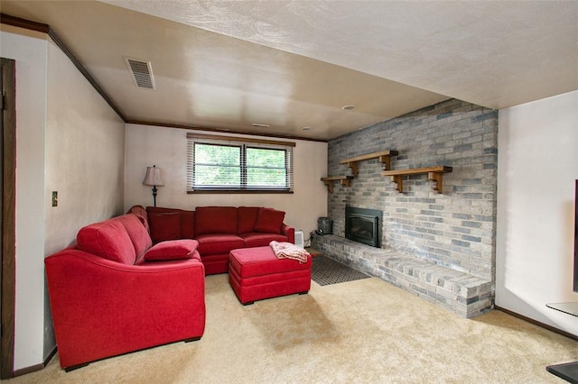 carpeted living area with a brick fireplace