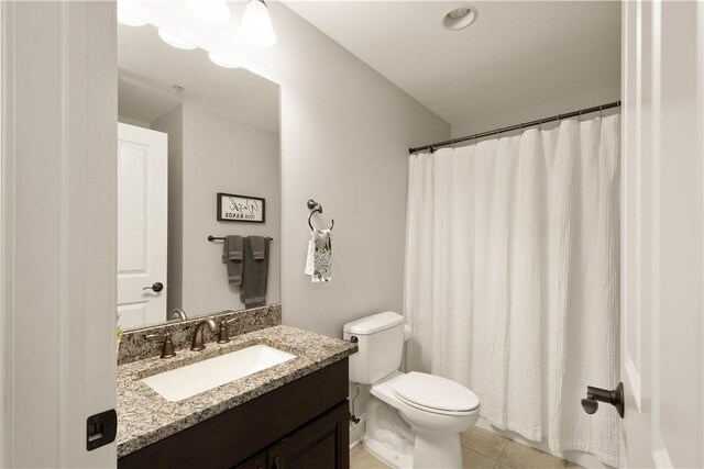 112 Shelton Place Dr, Connoquenessing Boro, PA 16033 - bathroom with toilet, vanity, tile patterned floors, and a shower with curtain