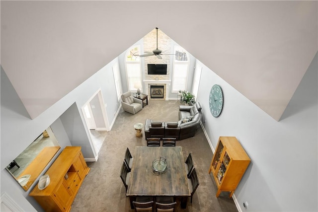 112 Shelton Place Dr, Connoquenessing Boro, PA 16033 - living room featuring carpet flooring, ceiling fan, baseboards, a fireplace, and vaulted ceiling
