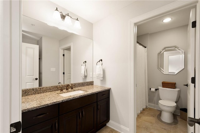 112 Shelton Place Dr, Connoquenessing Boro, PA 16033 - bathroom with vanity, toilet, baseboards, and tile patterned floors