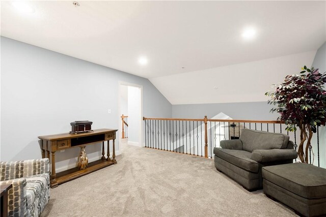 112 Shelton Place Dr, Connoquenessing Boro, PA 16033 - living area with carpet floors, an upstairs landing, vaulted ceiling, and baseboards