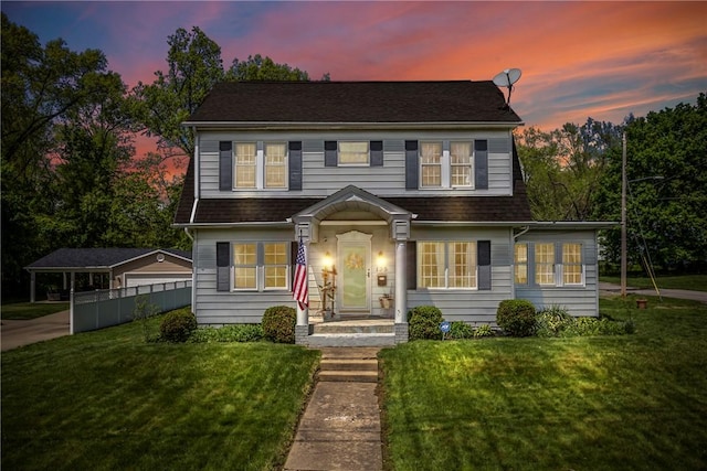 view of front of property with a shingled roof