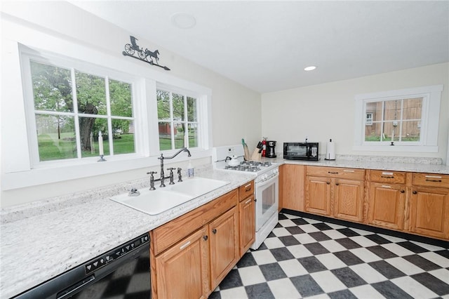 154 E Kittanning St, W/N Mahoning Twps, PA 16256 - kitchen featuring black appliances, a sink, dark floors, light countertops, and recessed lighting
