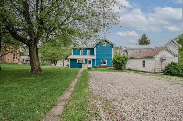 154 E Kittanning St, W/N Mahoning Twps, PA 16256 - view of front facade with driveway and a front yard