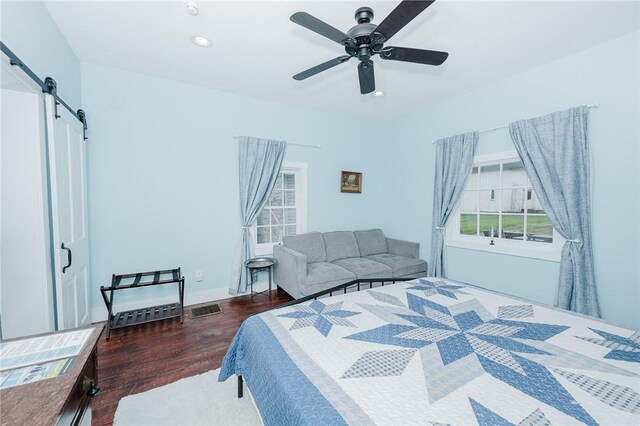 154 E Kittanning St, W/N Mahoning Twps, PA 16256 - bedroom with a barn door, wood finished floors, recessed lighting, a ceiling fan, and baseboards