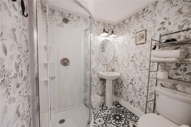 154 E Kittanning St, W/N Mahoning Twps, PA 16256 - full bath with a stall shower, toilet, tile patterned flooring, wallpapered walls, and a sink