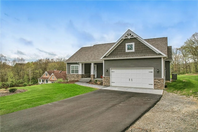craftsman inspired home with stone siding, asphalt driveway, a front lawn, and a shingled roof