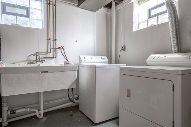 washroom featuring washing machine and dryer