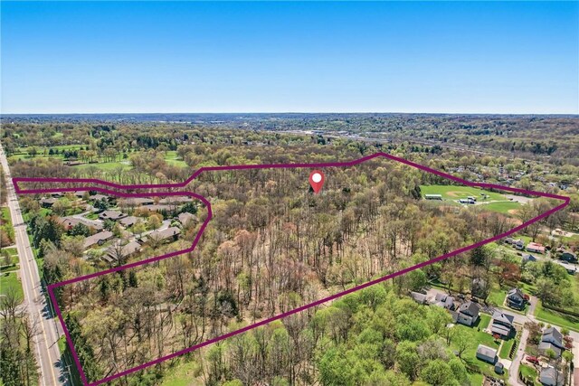 1700 Forker Blvd, Hermitage, PA 16148 - aerial overview of property's location with property boundaries highlighted and a heavily wooded area