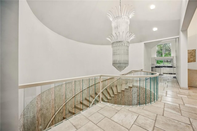 1700 Forker Blvd, Hermitage, PA 16148 - stairway featuring a chandelier, stone tile floors, and recessed lighting