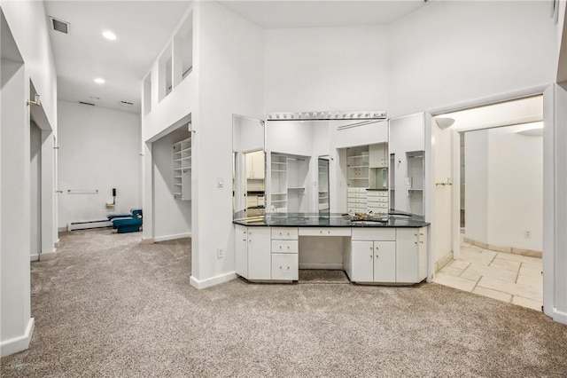 1700 Forker Blvd, Hermitage, PA 16148 - bathroom featuring a high ceiling, baseboards, a baseboard heating unit, and recessed lighting