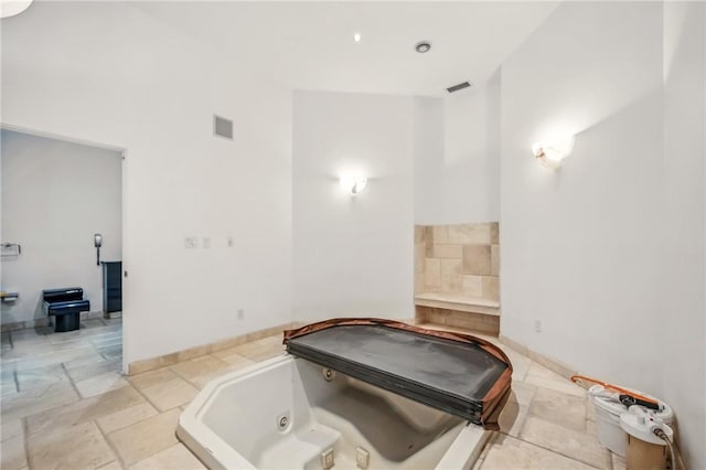 1700 Forker Blvd, Hermitage, PA 16148 - bathroom with a jetted tub and baseboards
