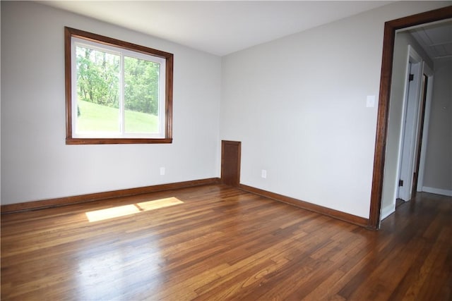 2113 Hillard Rd, Bethel Park, PA 15102 - unfurnished room with dark wood-style floors, baseboards, and attic access