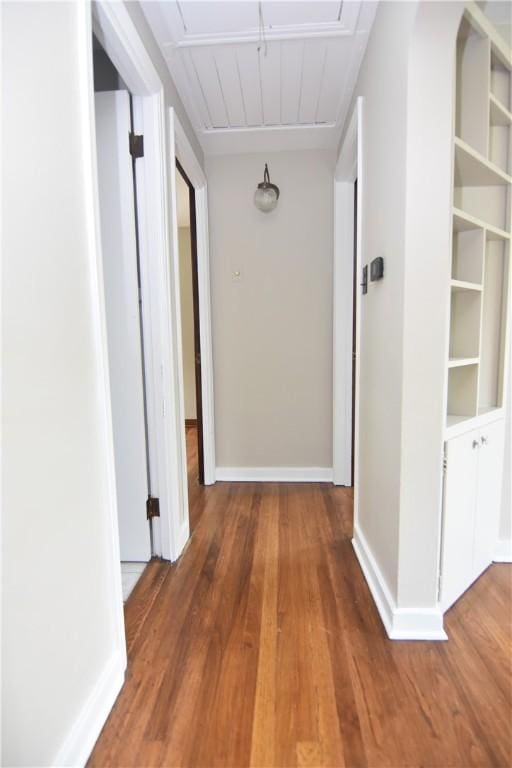 2113 Hillard Rd, Bethel Park, PA 15102 - hallway with wood finished floors, baseboards, and attic access