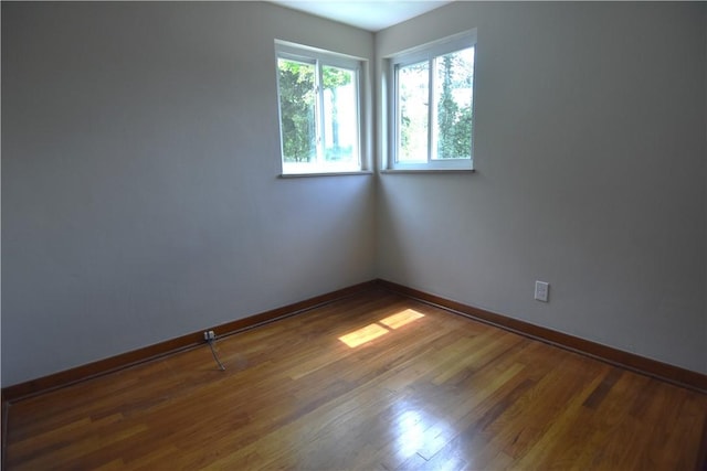 2113 Hillard Rd, Bethel Park, PA 15102 - empty room featuring wood finished floors and baseboards