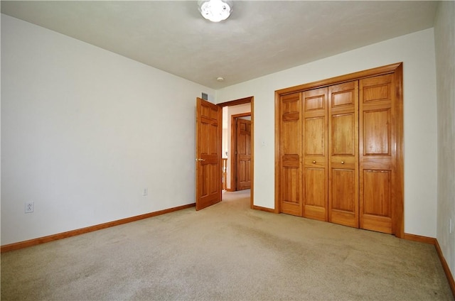 1004 Cicero Dr, Hempfield Twp Wml, PA 15642 - unfurnished bedroom featuring light colored carpet, baseboards, and a closet