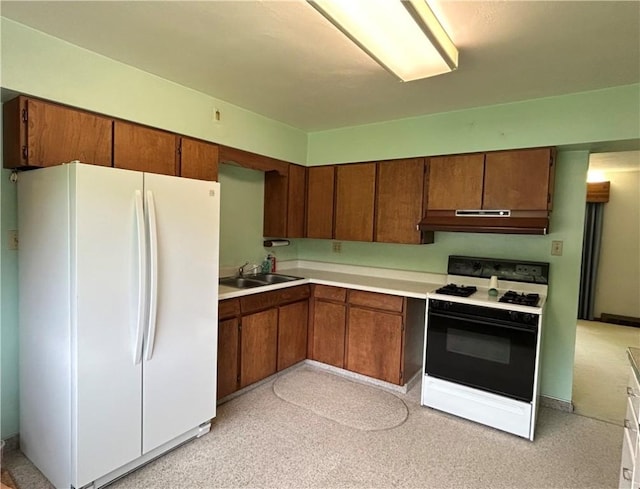 90 Dague Ln, South Franklin, PA 15301 - kitchen with white appliances, a sink, under cabinet range hood, light countertops, and brown cabinetry