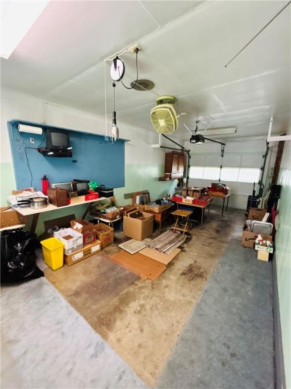 90 Dague Ln, South Franklin, PA 15301 - misc room with unfinished concrete floors and a garage