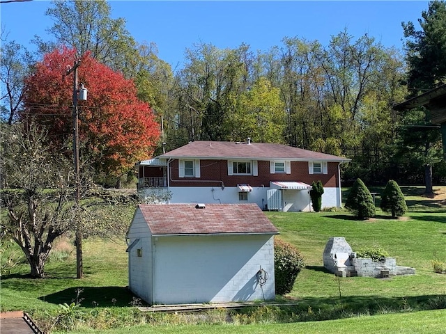 90 Dague Ln, South Franklin, PA 15301 - rear view of property featuring a lawn
