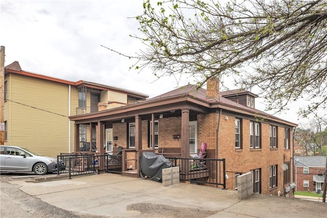 2832 Clermont Ave, Brentwood, PA 15227 - view of property exterior featuring brick siding and a chimney