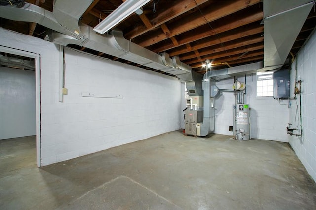 102 Olive Dr, Level Green, PA 15085 - basement featuring water heater, electric panel, concrete block wall, and heating unit