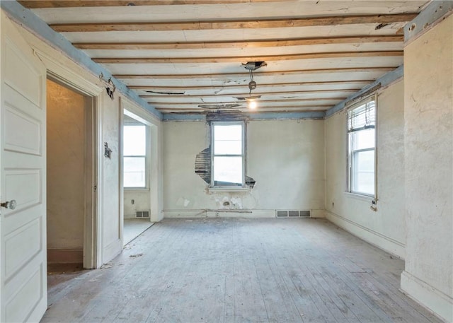spare room with light wood-type flooring