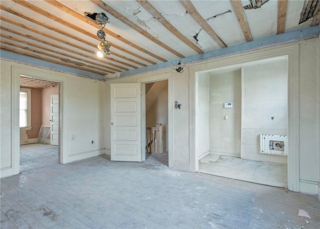 unfurnished bedroom featuring connected bathroom