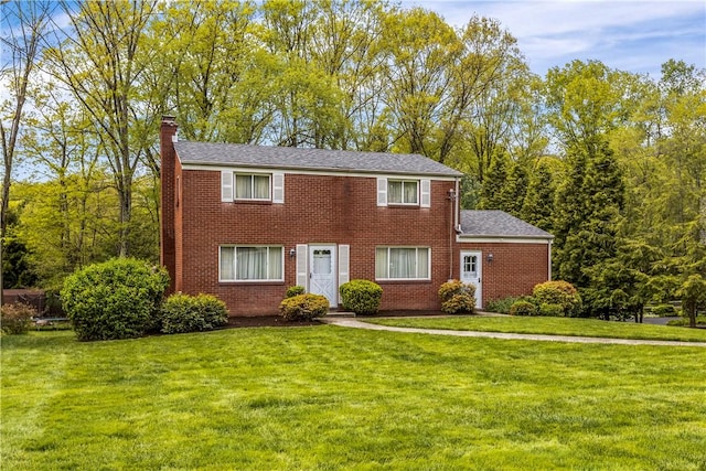 677 Olive St, Mccandless, PA 15237 - colonial inspired home with a chimney, a front lawn, and brick siding