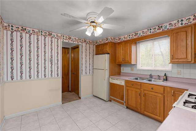677 Olive St, Mccandless, PA 15237 - kitchen with freestanding refrigerator, dishwashing machine, a sink, light countertops, and ceiling fan