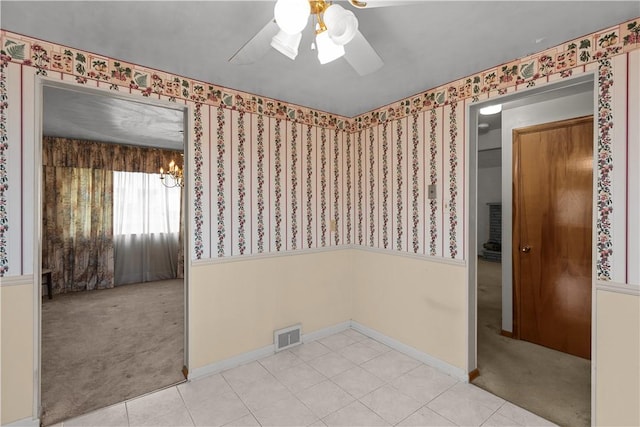 677 Olive St, Mccandless, PA 15237 - unfurnished room featuring wallpapered walls, a ceiling fan, a chandelier, light carpet, and baseboards