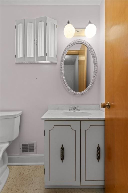 677 Olive St, Mccandless, PA 15237 - bathroom with baseboards, vanity, and toilet