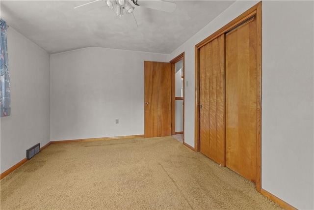 677 Olive St, Mccandless, PA 15237 - unfurnished bedroom featuring carpet flooring, lofted ceiling, a closet, baseboards, and ceiling fan