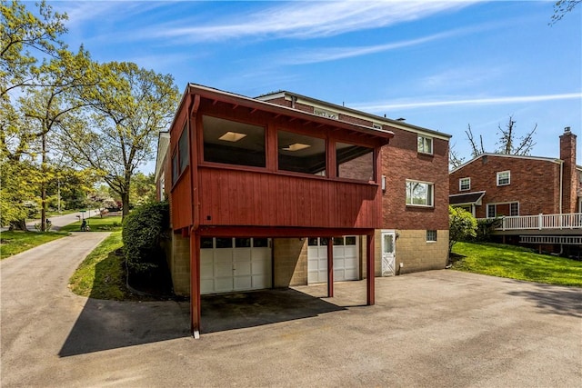 677 Olive St, Mccandless, PA 15237 - back of property with an attached garage and driveway