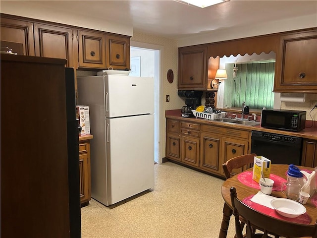 316 Franklin Dr, Peters Twp, PA 15241 - kitchen with black appliances, a sink, light flooring, and wallpapered walls