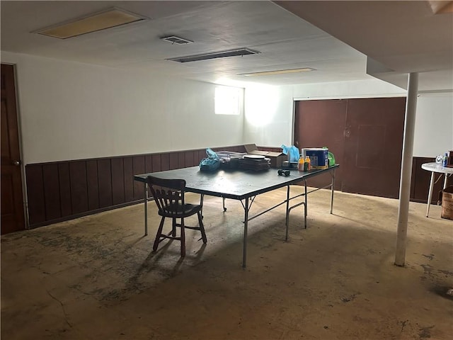 316 Franklin Dr, Peters Twp, PA 15241 - game room featuring unfinished concrete flooring and a wainscoted wall