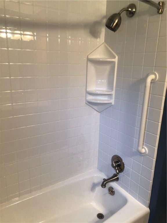 full bathroom with shower / tub combo with curtain