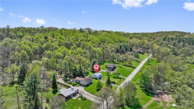 drone / aerial view of a heavily wooded area
