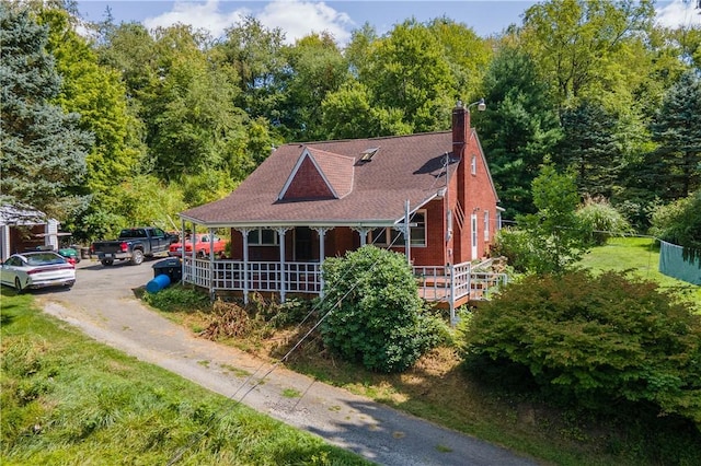 2915 Kane Rd, Hopewell Twp Bea, PA 15001 - view of front of house featuring covered porch, a chimney, and a shingled roof