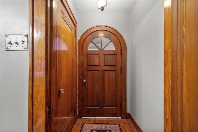 doorway with wood finished floors
