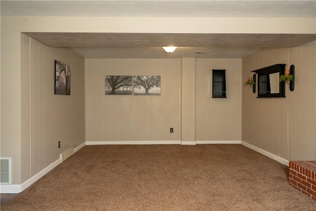 basement with carpet floors and baseboards