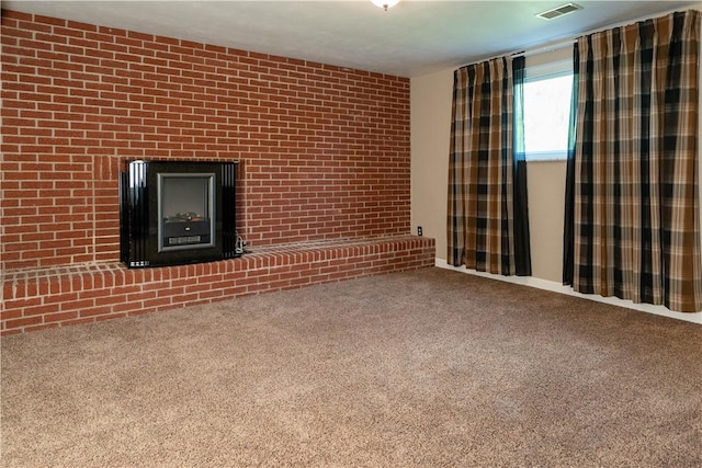 unfurnished living room featuring carpet flooring