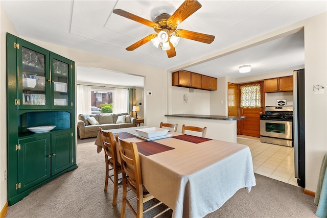 2228 Walton Ave, Overbrook, PA 15210 - dining area with light carpet and ceiling fan