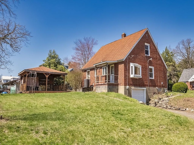 170 Millerstown Culmerville Rd, West Deer, PA 15084 - view of side of property with an attached garage, a chimney, a lawn, and brick siding