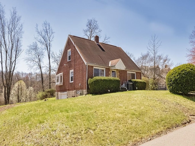 170 Millerstown Culmerville Rd, West Deer, PA 15084 - view of home's exterior with brick siding, a yard, a chimney, and an attached garage