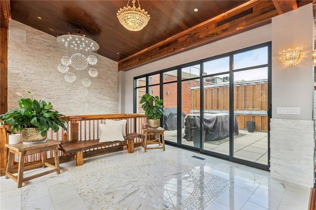 common area featuring wooden ceiling and a towering ceiling