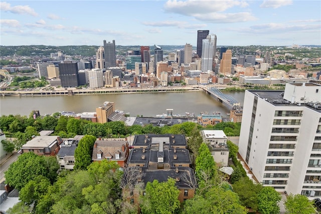 view of urban area with a large body of water